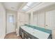 Bathroom with double sink vanity and modern fixtures at 408 Fletcher St, Port Charlotte, FL 33954