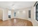 Bedroom featuring light walls, wood floors, and natural lighting at 408 Fletcher St, Port Charlotte, FL 33954