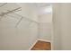 Walk-in closet with wire shelving and wood floors at 408 Fletcher St, Port Charlotte, FL 33954