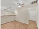 Spacious living area with tile flooring and an open doorway at 408 Fletcher St, Port Charlotte, FL 33954