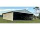 Large barn perfect for storage, workshop, or hobby space at 4353 Hidden River Rd, Sarasota, FL 34240