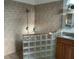 Modern bathroom featuring tiled walk-in shower and vanity with sink at 4353 Hidden River Rd, Sarasota, FL 34240