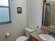 Cozy bathroom featuring granite countertop, tiled shower, and neutral decor at 4353 Hidden River Rd, Sarasota, FL 34240