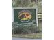 Community sign shows an airplane and wildlife, advertising the airport community at 4353 Hidden River Rd, Sarasota, FL 34240