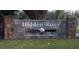 Hidden River entrance sign for a private aviation community at 4353 Hidden River Rd, Sarasota, FL 34240