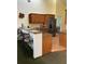 Stylish kitchen with stainless steel appliances and granite countertops with bar seating at 4353 Hidden River Rd, Sarasota, FL 34240
