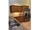Kitchen featuring stainless steel appliances, granite countertops, and custom cabinetry at 4353 Hidden River Rd, Sarasota, FL 34240