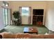 Bright living room with furniture and sliding glass doors to the patio at 4353 Hidden River Rd, Sarasota, FL 34240