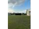 Expansive property featuring a barn and home with plenty of open space at 4353 Hidden River Rd, Sarasota, FL 34240