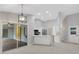 Bright kitchen with white cabinets, stainless steel appliances, and island at 4473 Diamond S Cir, Sarasota, FL 34233