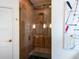 Modern shower with custom wood and tile work at 4492 Del Sol Blvd, Sarasota, FL 34243
