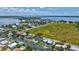 Scenic waterfront home with pool and dock on a tranquil canal at 4506 17Th W St, Palmetto, FL 34221