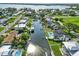 Aerial view of the neighborhood showcasing the canal-front homes and boating access at 4506 17Th W St, Palmetto, FL 34221