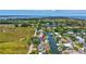 Waterfront home featuring a dock on a picturesque canal with open bay views at 4506 17Th W St, Palmetto, FL 34221