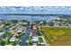Waterfront property boasts a private dock, beautiful landscaping, and is close to the open Bay at 4506 17Th W St, Palmetto, FL 34221