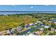 Breathtaking aerial view of a waterfront property with a private pool and dock at 4506 17Th W St, Palmetto, FL 34221