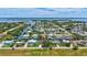 Aerial view of waterfront homes, canal, and neighborhood at 4506 17Th W St, Palmetto, FL 34221