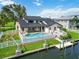Waterfront home with pool, patio, and boat dock perfect for entertaining at 4506 17Th W St, Palmetto, FL 34221