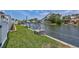 Ground level shot of the backyard along the canal at 4506 17Th W St, Palmetto, FL 34221