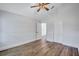 This bedroom features a modern ceiling fan and wood flooring at 4506 17Th W St, Palmetto, FL 34221
