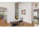 Cozy dining area features a modern table and chairs, plus eye-catching artwork at 4506 17Th W St, Palmetto, FL 34221