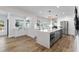 Bright open kitchen with an island, stainless steel appliances, cabinetry, and natural light at 4506 17Th W St, Palmetto, FL 34221