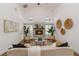 Cozy living room featuring a fireplace, vaulted ceilings, and comfortable seating at 4506 17Th W St, Palmetto, FL 34221