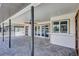 Wide angle shot of the patio with a ceiling fan and view of the pool at 4506 17Th W St, Palmetto, FL 34221