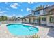 Backyard oasis with a refreshing pool and brick patio, ideal for entertaining at 4506 17Th W St, Palmetto, FL 34221