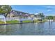 Waterfront home with fenced yard, boat lift, and dock, offering serene water views at 4506 17Th W St, Palmetto, FL 34221