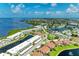 Breathtaking aerial view showcasing community housing, serene lakes, and lush green spaces at 4736 Independence Dr # 4736, Bradenton, FL 34210