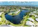 Panoramic aerial view of a lakeside community with multiple ponds and mature landscaping at 4736 Independence Dr # 4736, Bradenton, FL 34210