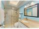 Elegant bathroom featuring a glass-enclosed shower, modern fixtures, and ample counter space at 4736 Independence Dr # 4736, Bradenton, FL 34210