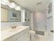 Bathroom features tile floors, a large mirror, and a shower with bathtub combination at 4736 Independence Dr # 4736, Bradenton, FL 34210