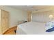 Cozy bedroom with a bed, large closet, dresser, and chair, creating a relaxing retreat at 4736 Independence Dr # 4736, Bradenton, FL 34210