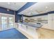 Features a large counter, white cabinetry, and modern appliances, perfect for community events and gatherings at 4736 Independence Dr # 4736, Bradenton, FL 34210