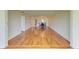 Open-concept living area featuring wood floors, dining room and kitchen at 4736 Independence Dr # 4736, Bradenton, FL 34210