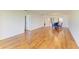 Open-concept living area featuring wood floors, dining room and kitchen at 4736 Independence Dr # 4736, Bradenton, FL 34210