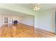 Open-concept living area featuring wood floors, dining room and kitchen at 4736 Independence Dr # 4736, Bradenton, FL 34210