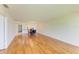 Open-concept living area featuring wood floors, dining room and kitchen at 4736 Independence Dr # 4736, Bradenton, FL 34210