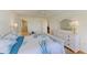 Bright bedroom featuring a ceiling fan, and coastal decor at 4736 Independence Dr # 4736, Bradenton, FL 34210
