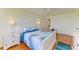 This serene bedroom has a water view, coastal decor, and a ceiling fan at 4736 Independence Dr # 4736, Bradenton, FL 34210