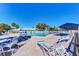 Relaxing pool area featuring lounge chairs and a shaded canopy for sunny days at 4736 Independence Dr # 4736, Bradenton, FL 34210