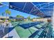 Outdoor shuffleboard court featuring comfortable bench seating and overhead canopy at 4736 Independence Dr # 4736, Bradenton, FL 34210