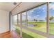 A tranquil water view framed by a large window showcases the outdoor scenery and natural light at 4736 Independence Dr # 4736, Bradenton, FL 34210