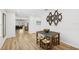 Dining area adjacent to the kitchen, featuring rustic table and seating at 4833 San Palermo Dr, Bradenton, FL 34208