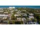Picturesque aerial view captures the property nestled in a vibrant coastal community with ocean views at 5026 Calle Minorga, Sarasota, FL 34242