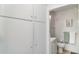 Bathroom view with storage and commode at 5026 Calle Minorga, Sarasota, FL 34242