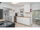 Cozy kitchen featuring stainless steel appliances and tile backsplash at 5026 Calle Minorga, Sarasota, FL 34242