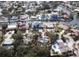 Aerial view of the home and surrounding mature landscaping in Siesta Isles at 5353 Shadow Lawn Dr, Sarasota, FL 34242